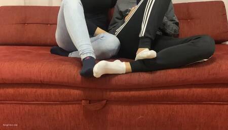 TWO GIRLS PLAYING SEXY FOOTSIE IN SOCKS BIG AND SMALL FEET - MP4 HD
