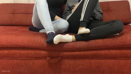 TWO GIRLS PLAYING SEXY FOOTSIE IN SOCKS BIG AND SMALL FEET - MP4 MOB