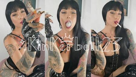 Human ashtray wearing PVC and Leather gloves