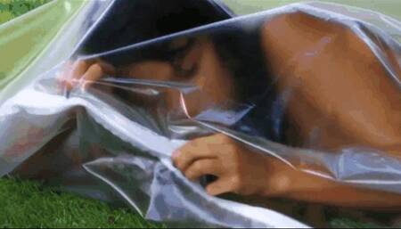 Hot brunette masturbates outdoor in lubed plastic bag
