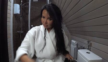 combing my long hair from the back of my head downwards with a comb c