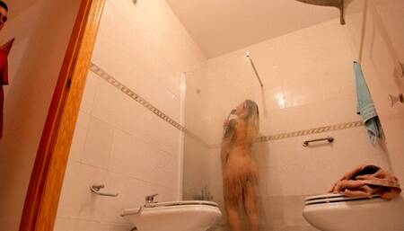 BUSTY BLONDE STEPMOM IN THE SHOWER GETS SURPRISE VISITOR