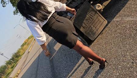 Balbina on black pantyhose cold starting and revving the huge Mack Truck