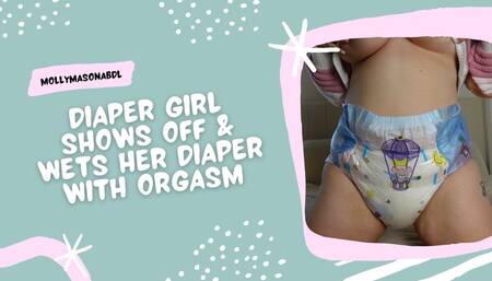 Diaper Girl Shows Off & Wets Diaper With Orgasm