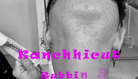 Rubbing & creaming on her bald head