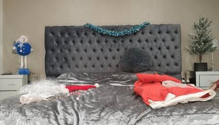 Bad Elf Tries On Santas Costume