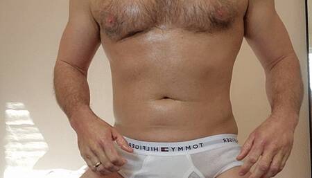 Big white dick drenched in oil and cumming