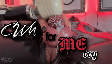 Rubber gimp made to cum in chastity cage