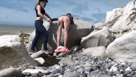 Spanking Slave on Beach