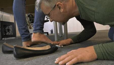 Employee distracted by his boss' stinky feet (small version)