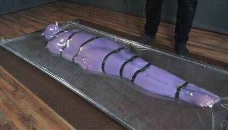 Tickling in a nylon cocoon and bondage with straps