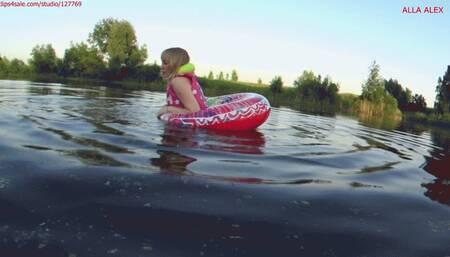 Alla swims on the lake and wears an inflatable vest and plays with an inflatable ring!!!