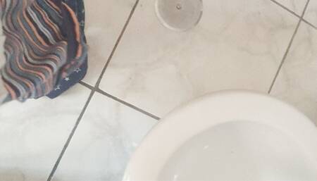 I change a small, pee-stained sanitary pad