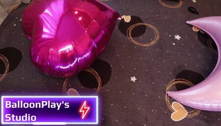 Popping helium foil balloons