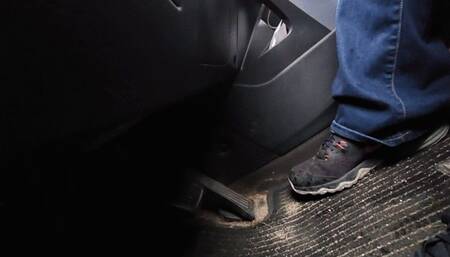 Driving in Black and Pink Nike Juniper Sneakers