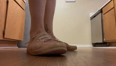 Well worn pink tennis shoes