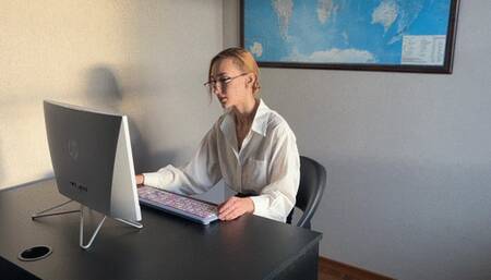 accountant at work plays with shoes and dreams of someone giving her a foot massage