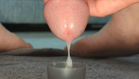Extreme closeup of me slowly teasing and edging out sperm drip by drip into a cup multiple cumshots collection feet load