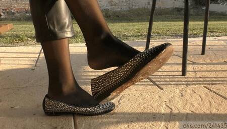 Beauty femdom blonde girl uses a stupid footstool man to clean her dirty ballet flats, perfect feet in nylons