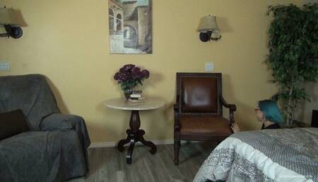 Mistress Amity comes back home and sits on the chair to have her attending female slave remove her heels and worship on her stockings feet