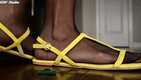 SMD walking around in her sandals unware of the tiny car crushed below! Part 2- MP4