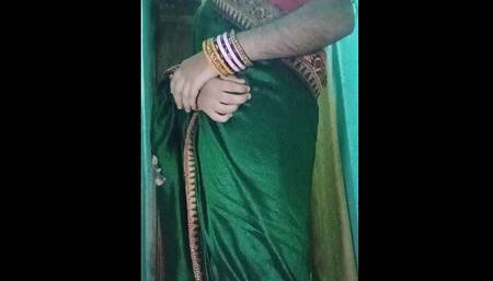 Indian Gay Crossdresser Gaurisissy in Green Saree Pressing Her Big Boobs and Fingering in Her Ass