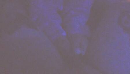 Hot Milf Goddess in blacklight gives rough femdom footjob and toejob to hard tattooed cock with extreme cumshot on her beautiful toes