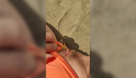 Exhibitionist Girl with Sand in Her Panties Pissing on the Beach