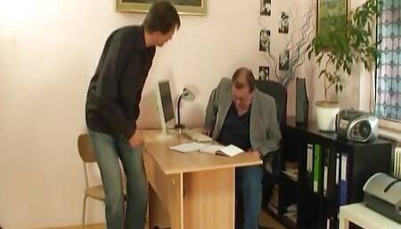 An Amazing Looking German Blonde Taking Two Hard Cocks in the Office