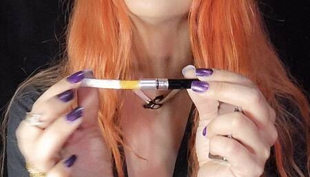 Blowing smoke in your face - smoking cork in the cigarette holder