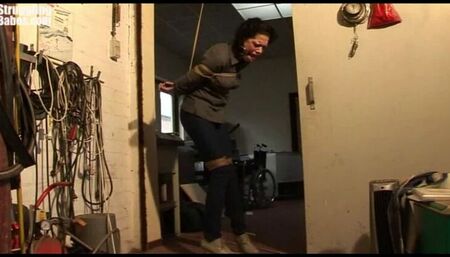Steffi dangling on rope tightly ballgagged