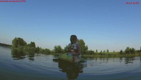 Alla is a hot rider on a squeaky glossy inflatable gecko on the lake!!!