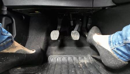 Laura Sanchez with her grey pump - Feet POV