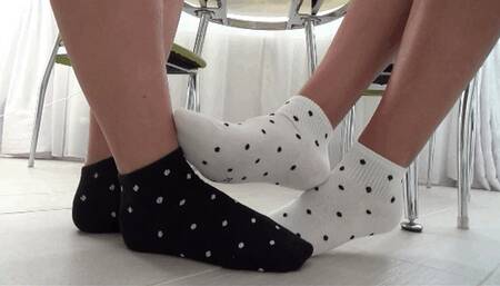 footsie in socks and wiggling toes So