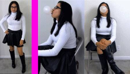 eRica shows us how she chews gum and blows bubbles while wearing a white turtleneck & leather skirt!