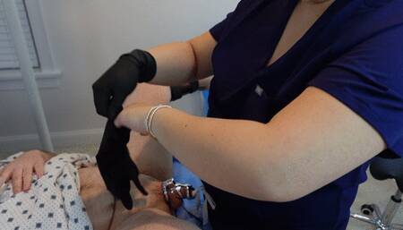 Doctor Jess performs an estim pegging on her caged patient