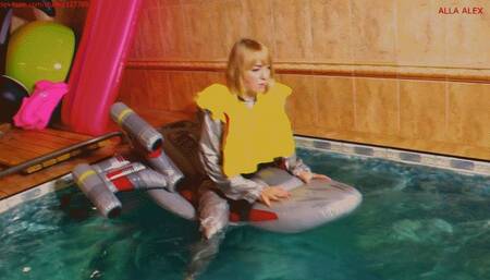 Alla floats astride an inflatable plane and an unknown person pierces the inflatable plane with a sharp object and Alla is saved thanks to an automatic inflatable vest!!!