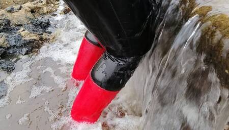 Red rubber boots and latex leggings