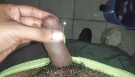 Young Boy Masturbating in the Toilet