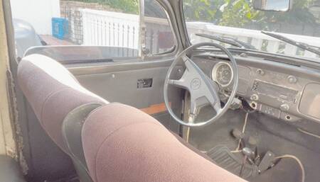 Aunt Barbara cranks stalls and warms the old Volkswagen Beetle and drives to visit step sister