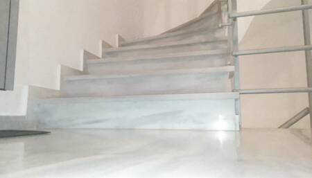 self pissing in a public staircase