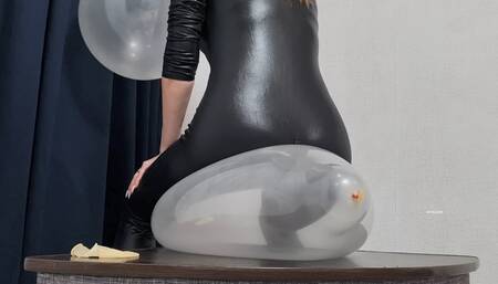 a sit pop of transparent balloons