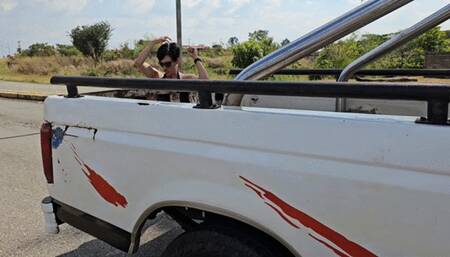 Milah Arches driving the uncle jesse truck on tight jeans and flip flops