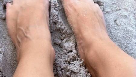 Sandy Vacation Feet Playing in Public