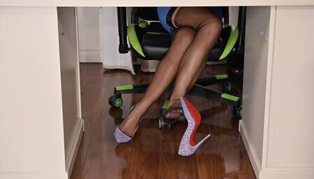 SECRETARY DANGLING HER SO KATE LOUBOUTIN