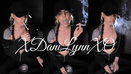 Smoking in Hat and Hoodie