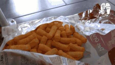 Working in the kitchen with her old worn Mules