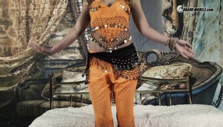 460 Izzy Delphine as orange jingling belly dancer