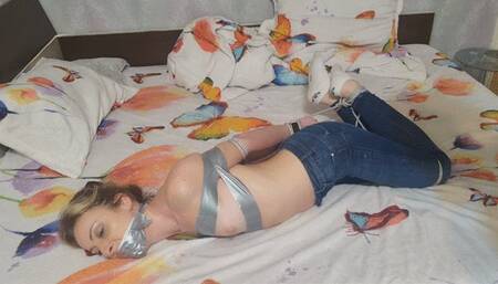 struggling while i am hogtied and gagged with tape