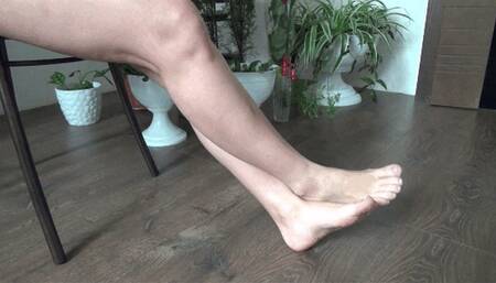 rubs feet crossed at the ankles 15 FP